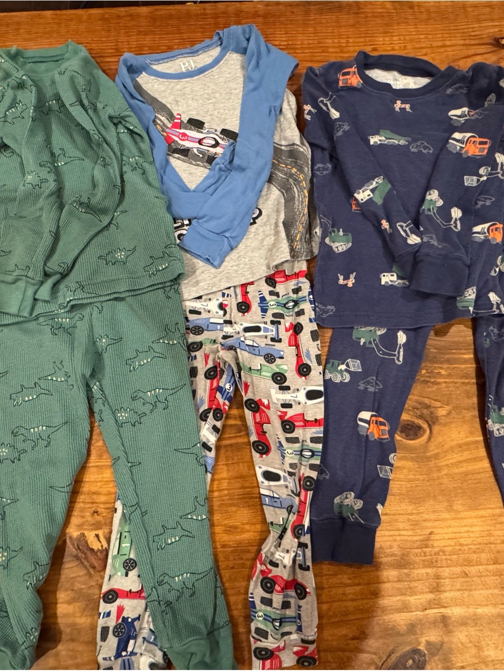 Carter's Green, Gray, and Navy Kids Pajama Sets with Dino and Vehicle Prints